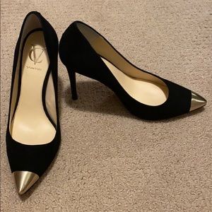Vince Camuto suede pump with gold metal toe.